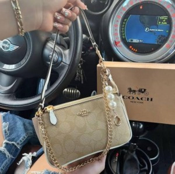 COACH SLING BAG
