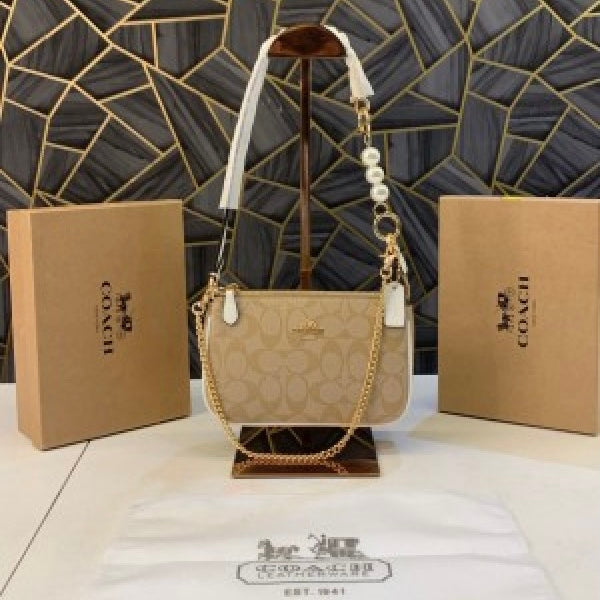COACH SLING BAG
