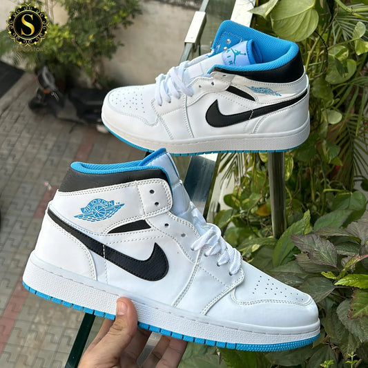 Nike air jordan 1s mid laser blue