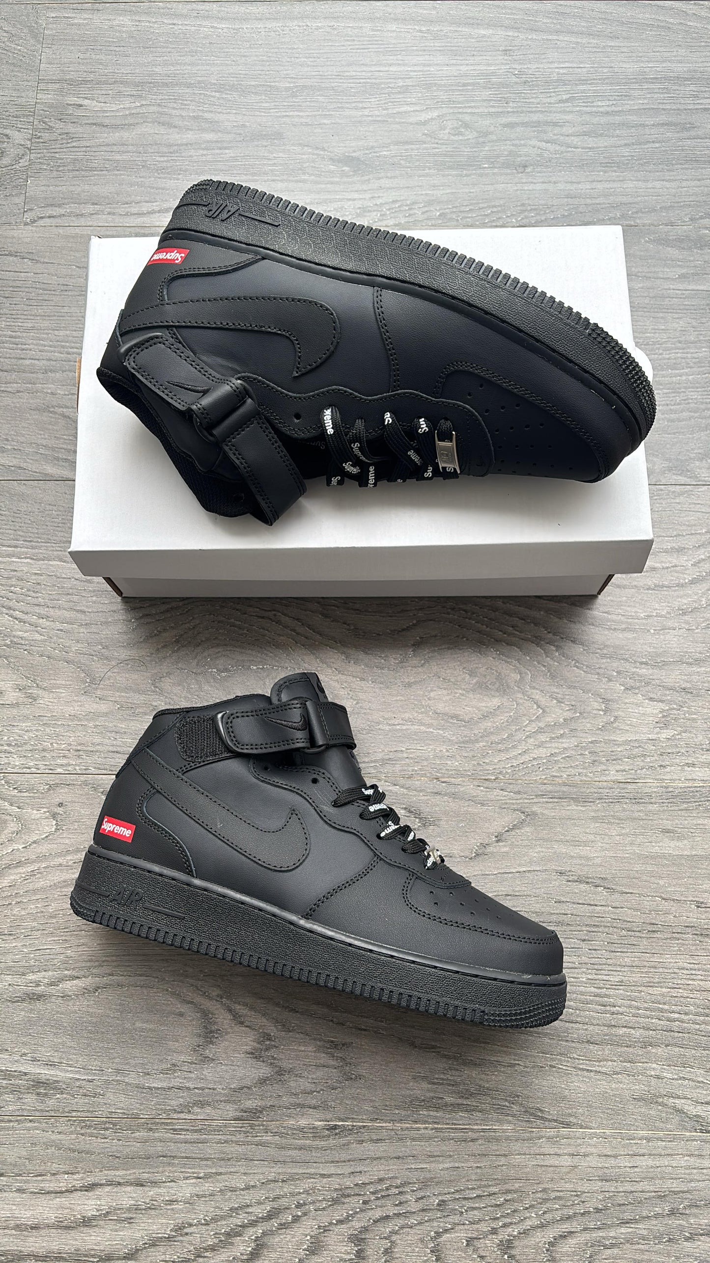 Nike airforce 1 mid black x supreme