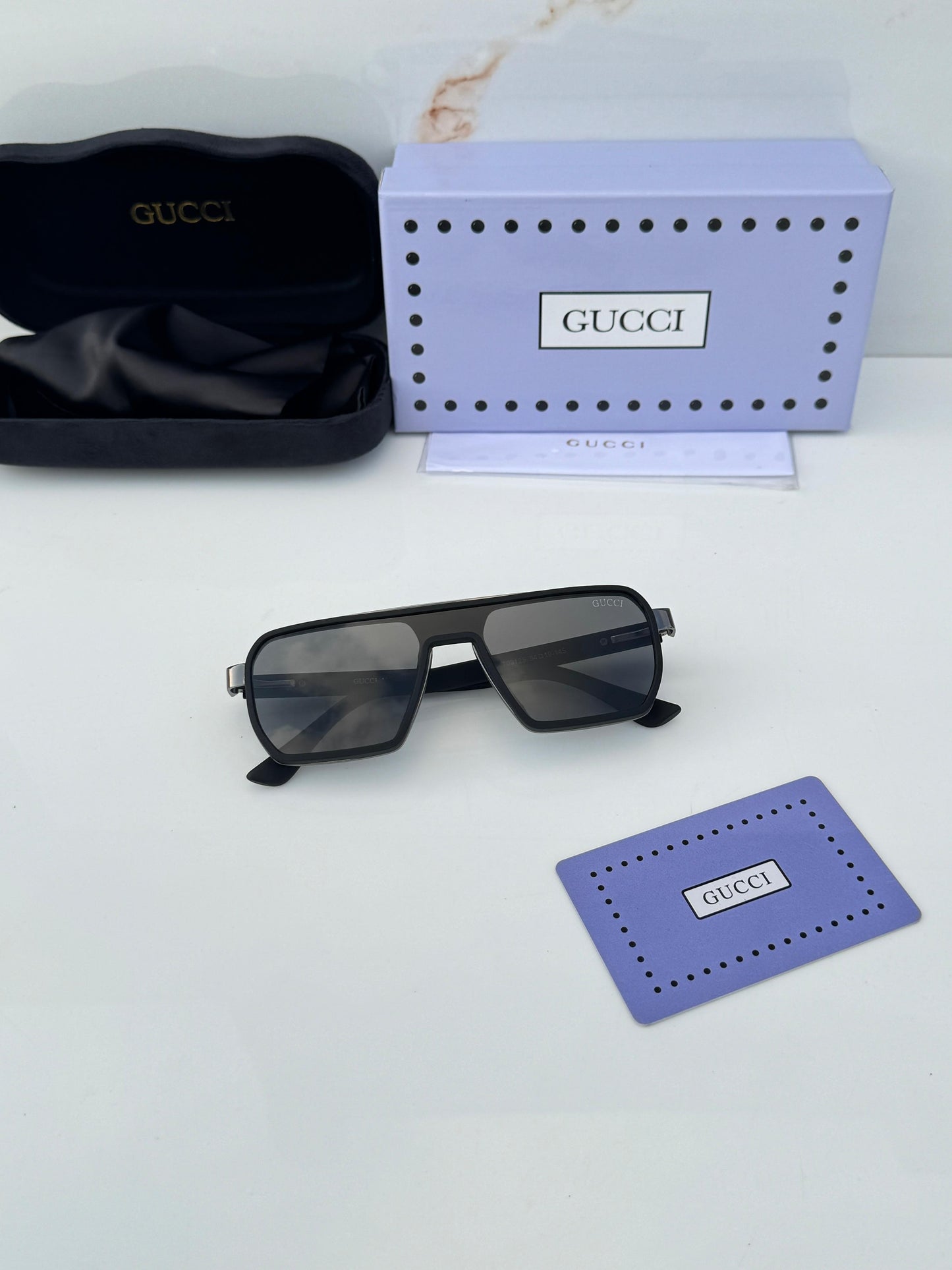 GUCCI